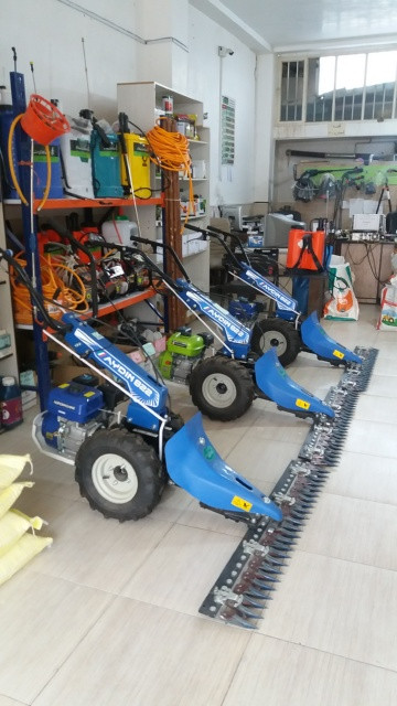 تراکتور دوچرخ علفچین دوکاره(درو و شخم)